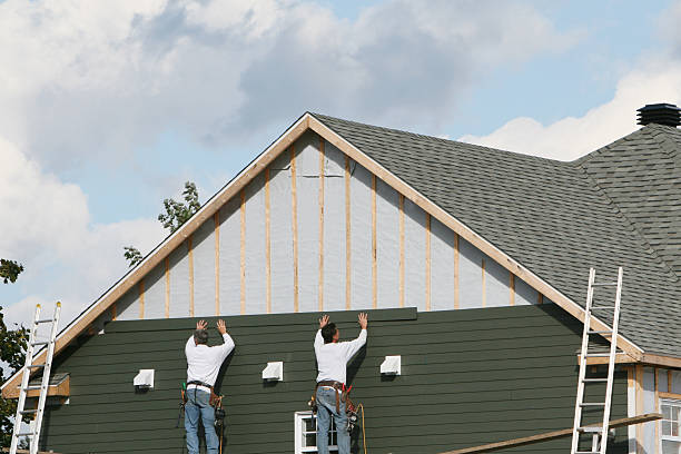 Professional Siding technician working in Fredericksburg, OH